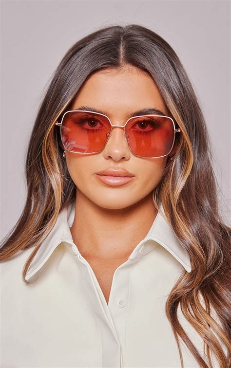 rose gold oversized sunglasses.